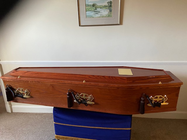 Cedar raised lid burial coffin