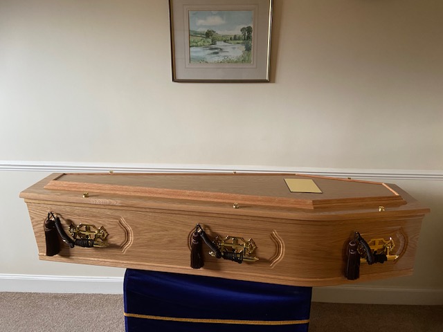 light oak raised lid panelled side burial coffin